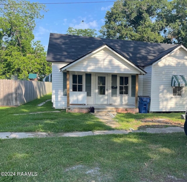 604 N Lejeune Ave, Kaplan, LA 70548 - bungalow-style home with covered porch and a shingled roof