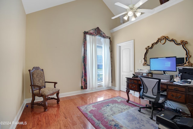 office space with light hardwood / wood-style flooring, high vaulted ceiling, and ceiling fan