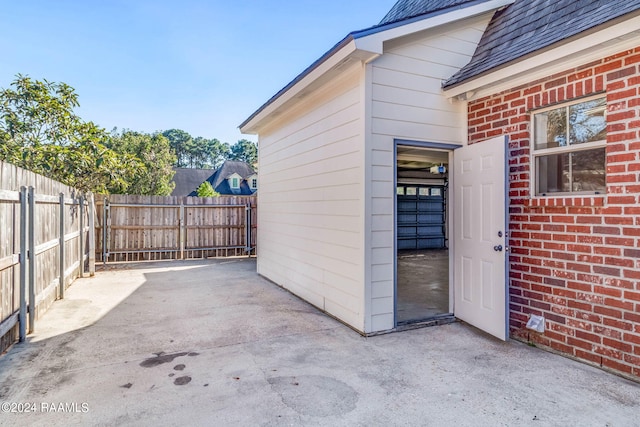 entrance to property with a patio