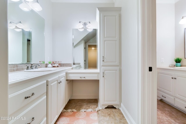 bathroom with vanity, crown molding, and tile patterned floors