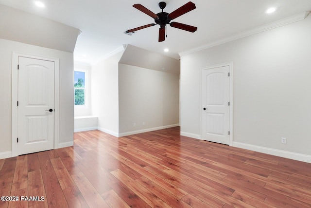 bonus room with light wood-type flooring and ceiling fan