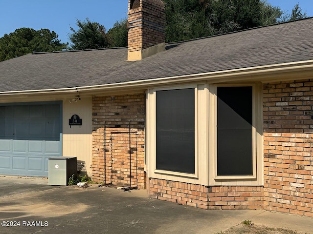 property entrance with a garage