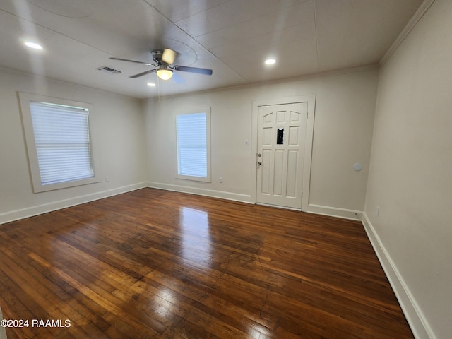 foyer entrance featuring ceiling fan, crown molding, and dark hardwood / wood-style flooring