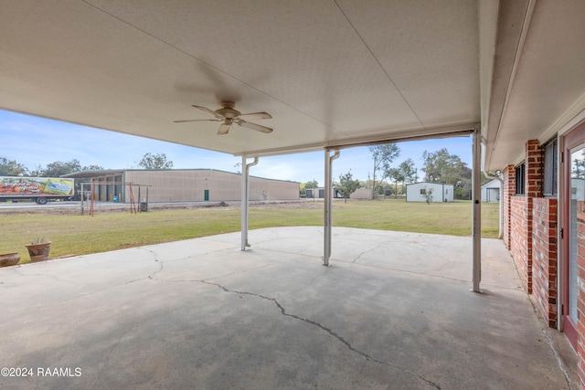 view of patio / terrace featuring ceiling fan