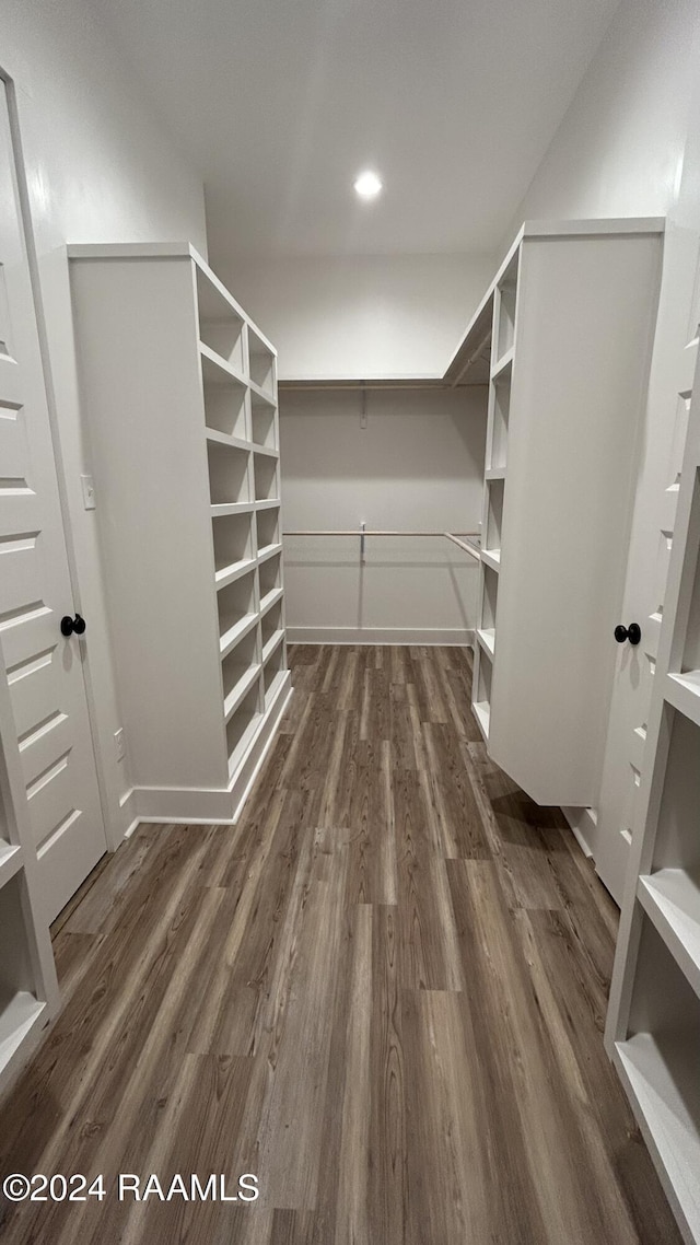 219 Harvest Creek Ln, Lafayette, LA 70508 - spacious closet featuring dark wood finished floors