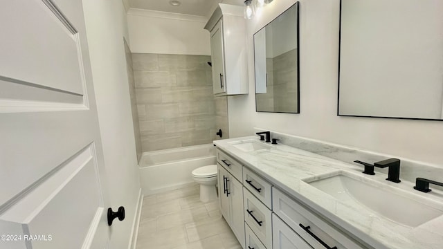 full bathroom with tile patterned floors, vanity, toilet, and tiled shower / bath combo