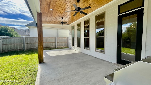 view of patio with ceiling fan