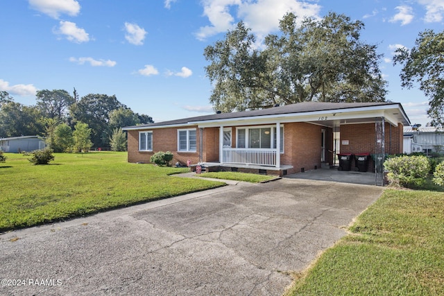 single story home featuring a front yard and a carport