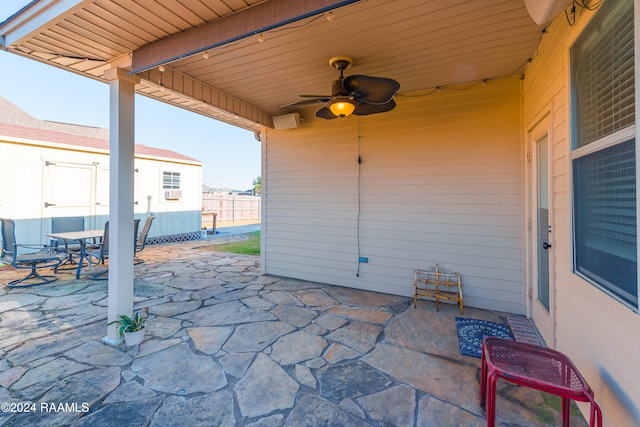 view of patio featuring ceiling fan