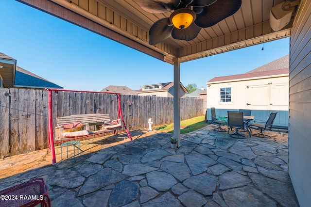 view of patio / terrace featuring ceiling fan