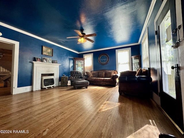 510 S Adams St, Welsh, LA 70591 - living room with a ceiling fan, hardwood / wood-style floors, crown molding, and a fireplace