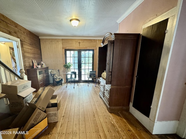510 S Adams St, Welsh, LA 70591 - sitting room with wooden walls, french doors, light wood-style floors, and crown molding