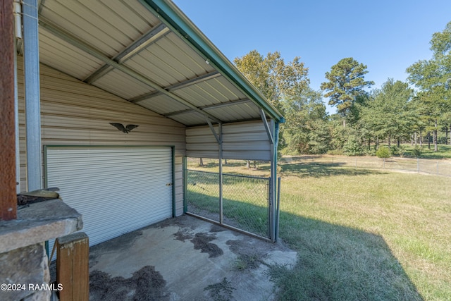 garage featuring a yard