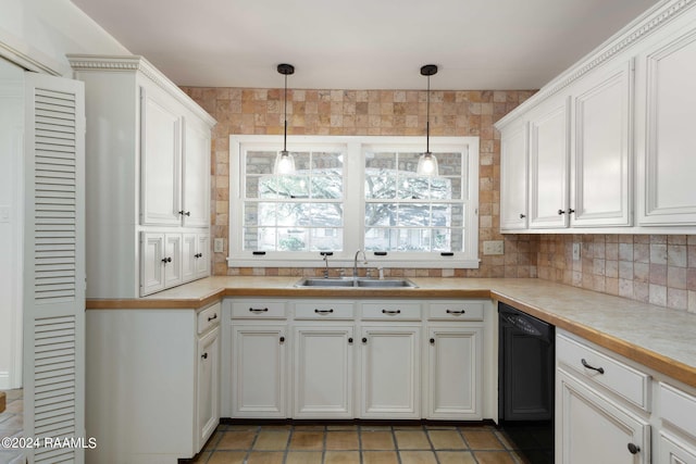 kitchen with dishwasher, decorative backsplash, sink, pendant lighting, and white cabinetry