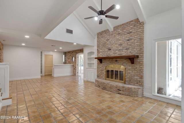 unfurnished living room with built in features, a brick fireplace, ceiling fan, high vaulted ceiling, and light tile patterned floors