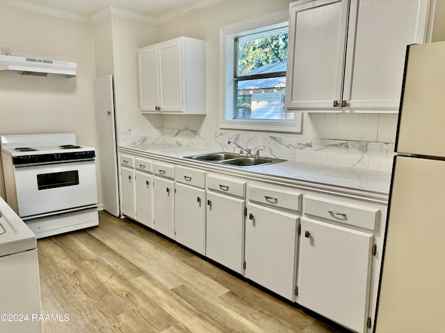 kitchen featuring white appliances, extractor fan, white cabinetry, and light wood-type flooring