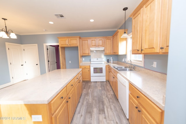 kitchen with white appliances, sink, light hardwood / wood-style floors, pendant lighting, and crown molding