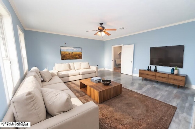 living room featuring ornamental molding, dark hardwood / wood-style floors, and ceiling fan