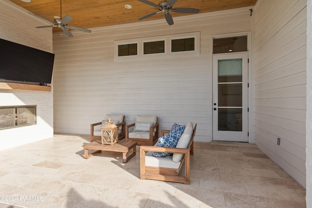 view of patio featuring ceiling fan