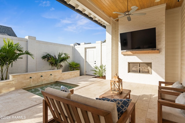 view of patio / terrace with ceiling fan