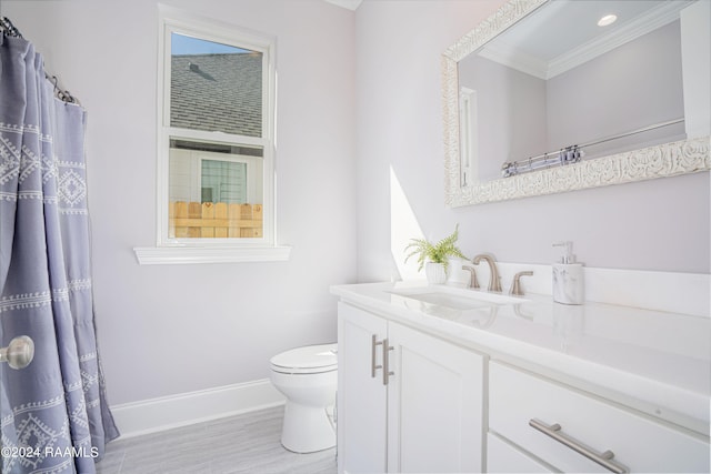 204 Treescape Dr, Lafayette, LA 70508 - full bath featuring crown molding, wood finished floors, baseboards, vanity, and toilet