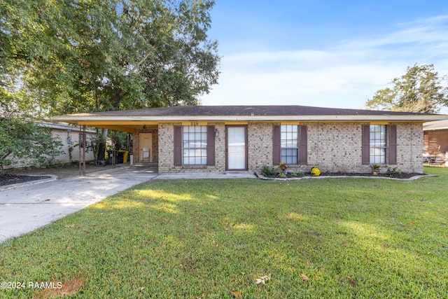 single story home with a carport and a front lawn