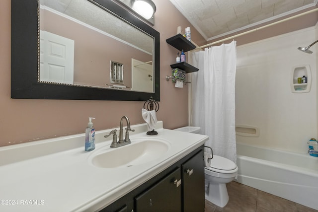 full bathroom featuring toilet, tile patterned floors, shower / bath combo with shower curtain, vanity, and crown molding