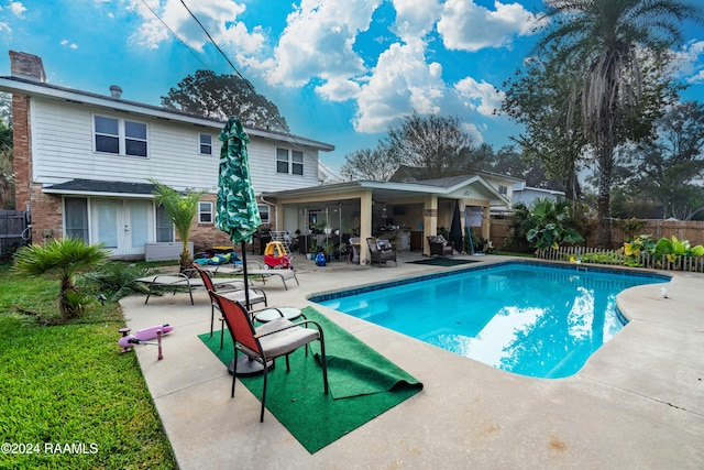 view of pool featuring a patio area