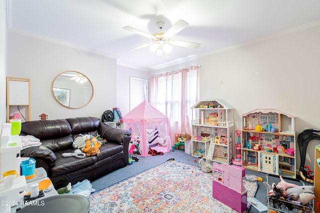 rec room featuring crown molding, carpet flooring, and ceiling fan