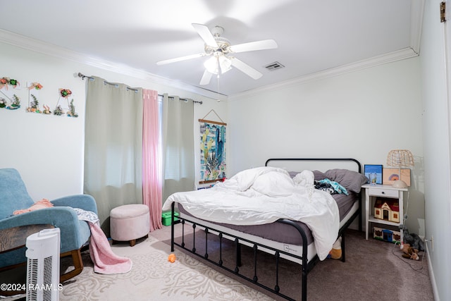 carpeted bedroom with ornamental molding and ceiling fan