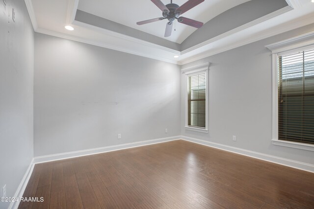 unfurnished room with hardwood / wood-style flooring, ceiling fan, plenty of natural light, and ornamental molding