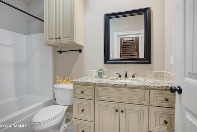 full bathroom with toilet, tub / shower combination, and vanity