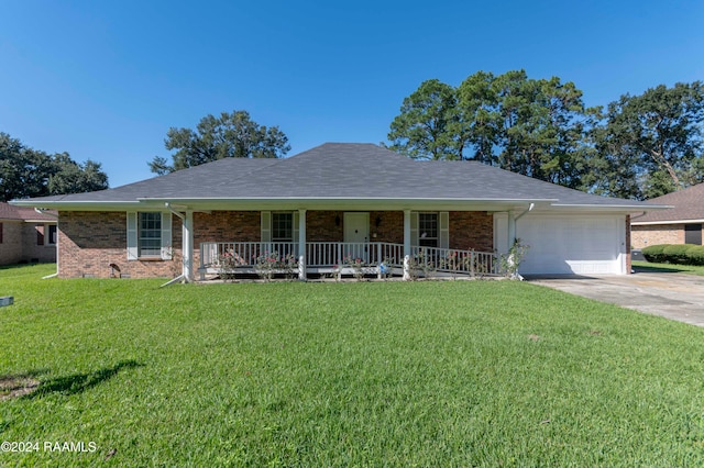 ranch-style house featuring a front lawn, a garage, and a porch