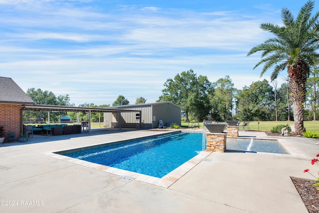 pool featuring a patio and outdoor lounge area