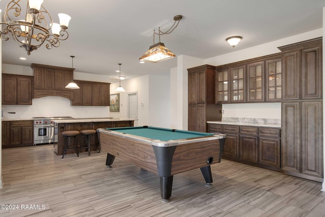 1053 Bayouside Ln, Parks, LA 70582 - game room featuring an inviting chandelier, pool table, light wood-style floors, and recessed lighting