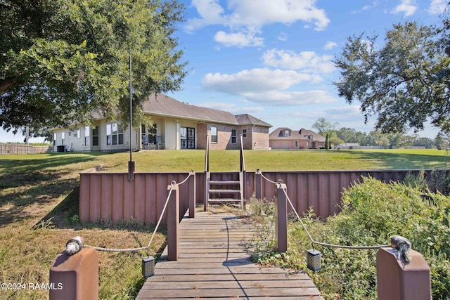 1053 Bayouside Ln, Parks, LA 70582 - rear view of property featuring a yard and fence