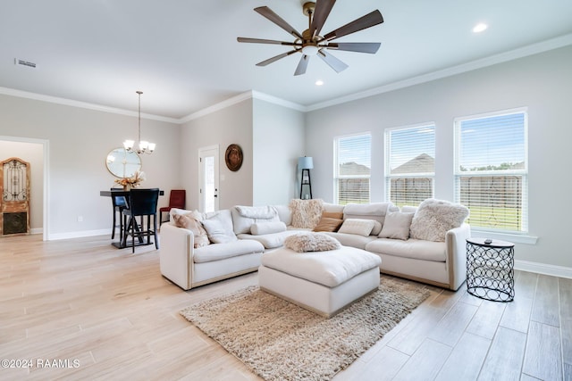 living room with light wood-type flooring, ceiling fan with notable chandelier, and crown molding