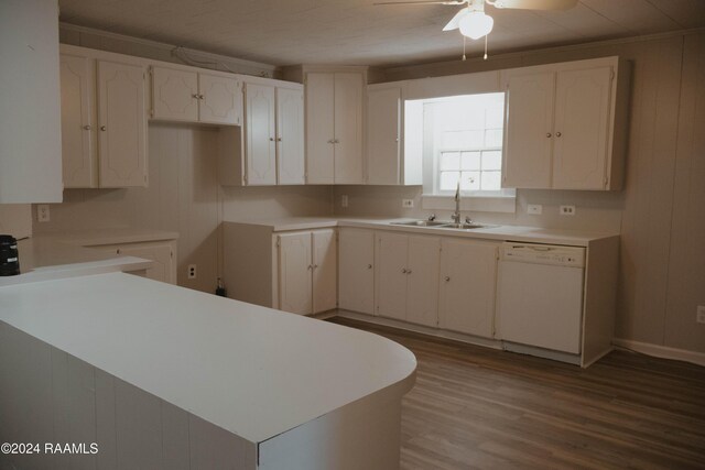 404 W Hickory St, Ville Platte, LA 70586 - kitchen featuring dishwasher, a sink, ceiling fan, wood finished floors, and white cabinetry