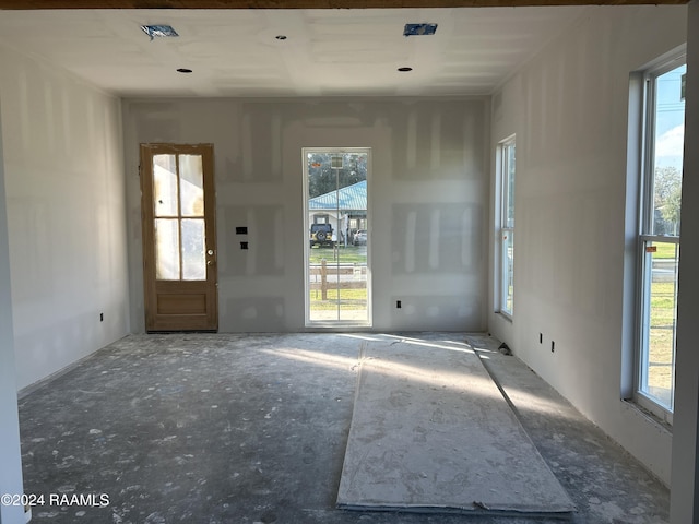 spare room featuring a wealth of natural light