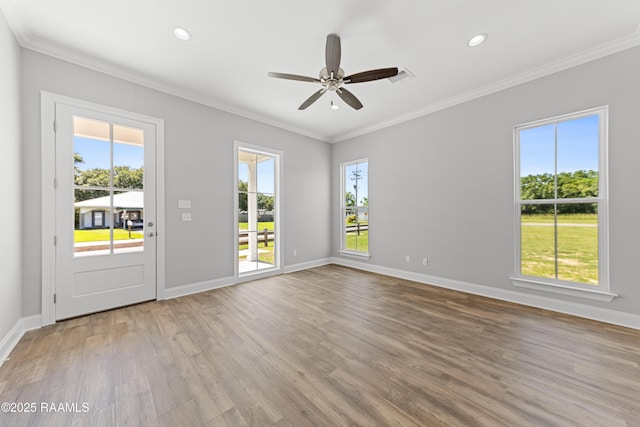 366 W Broussard Rd, Lafayette, LA 70506 - unfurnished room with healthy amount of natural light, light wood-style floors, ornamental molding, baseboards, and a ceiling fan