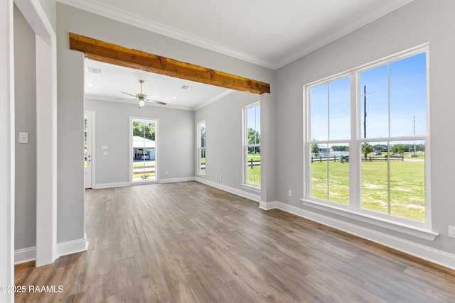 366 W Broussard Rd, Lafayette, LA 70506 - unfurnished living room featuring wood finished floors, baseboards, ornamental molding, ceiling fan, and beam ceiling