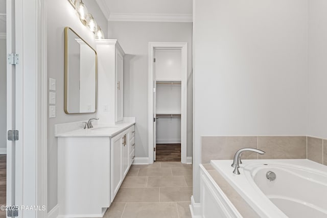 366 W Broussard Rd, Lafayette, LA 70506 - full bath featuring vanity, a garden tub, ornamental molding, baseboards, and tile patterned floors