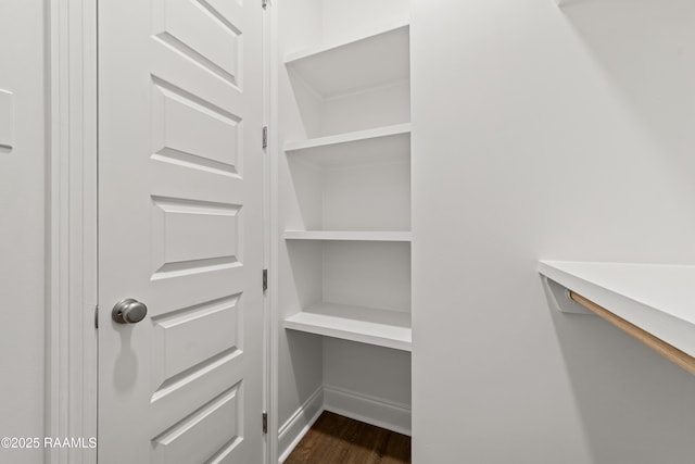 366 W Broussard Rd, Lafayette, LA 70506 - spacious closet featuring dark wood finished floors