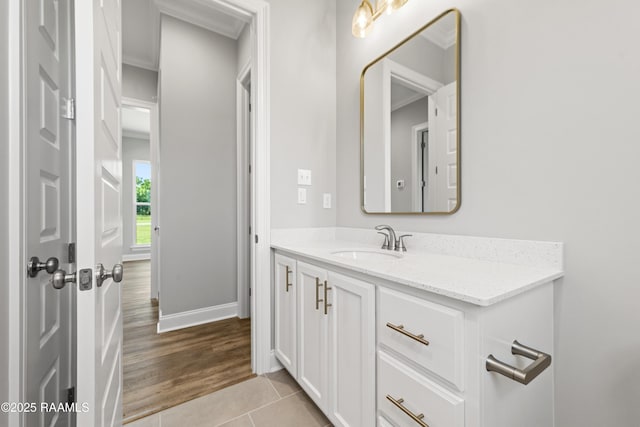 366 W Broussard Rd, Lafayette, LA 70506 - bathroom featuring vanity, tile patterned flooring, baseboards, and crown molding