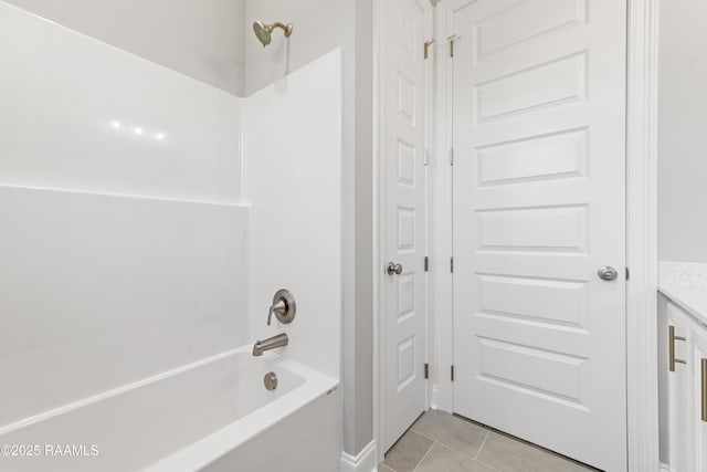 366 W Broussard Rd, Lafayette, LA 70506 - bathroom with tile patterned floors, bathtub / shower combination, and vanity
