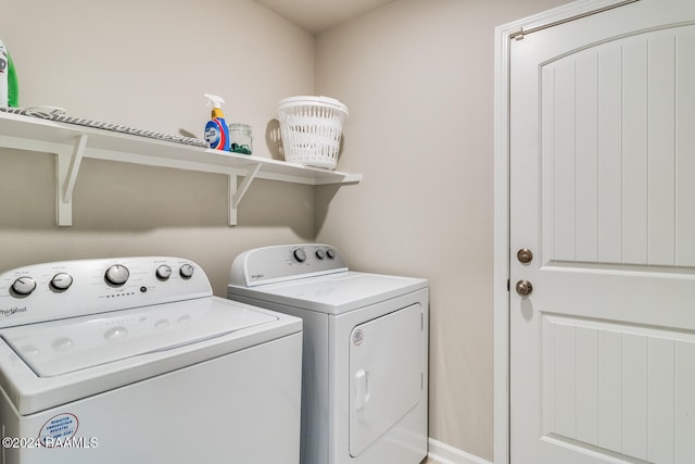 laundry area with washing machine and dryer