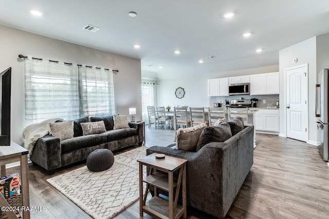 living room with light wood-type flooring