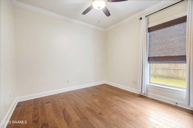 unfurnished room with wood-type flooring, ornamental molding, and ceiling fan