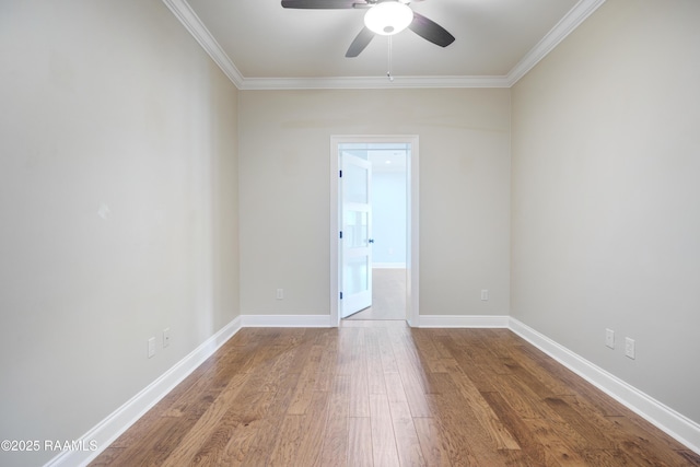 unfurnished room featuring ceiling fan, ornamental molding, and hardwood / wood-style floors