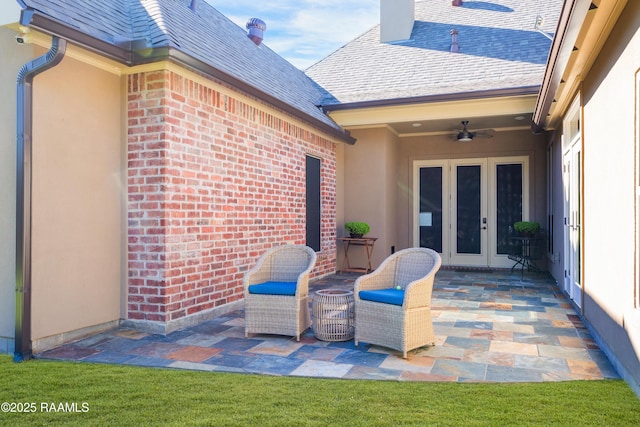 view of patio with french doors and ceiling fan